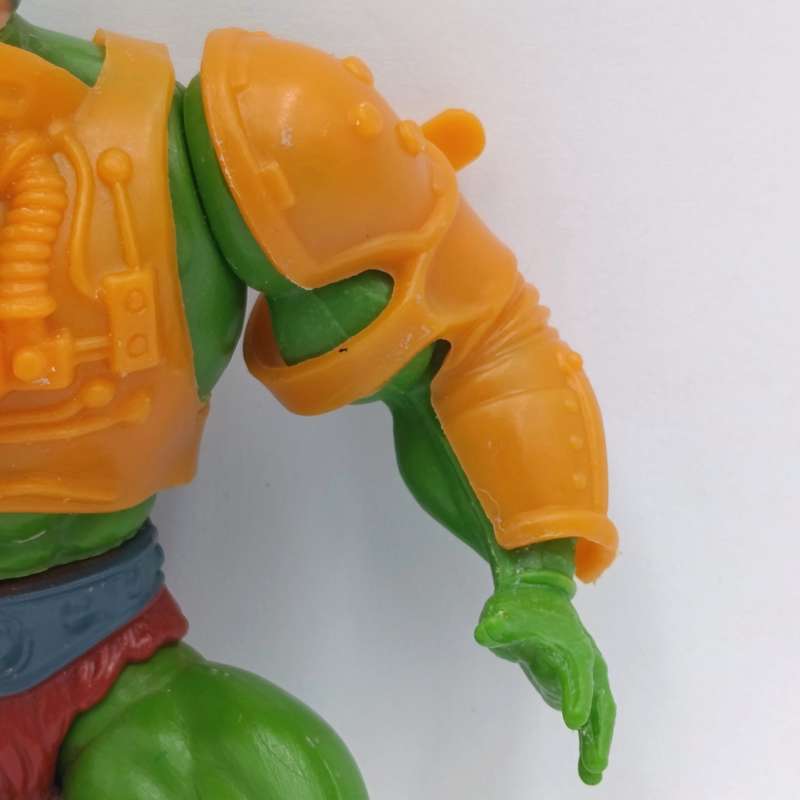 Vintage Masters of the Universe Man-at-Arms figurine with weapons and accessories