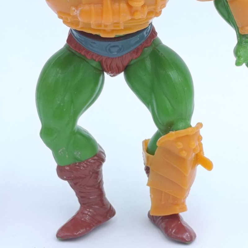 Vintage Masters of the Universe Man-at-Arms figurine with weapons and accessories