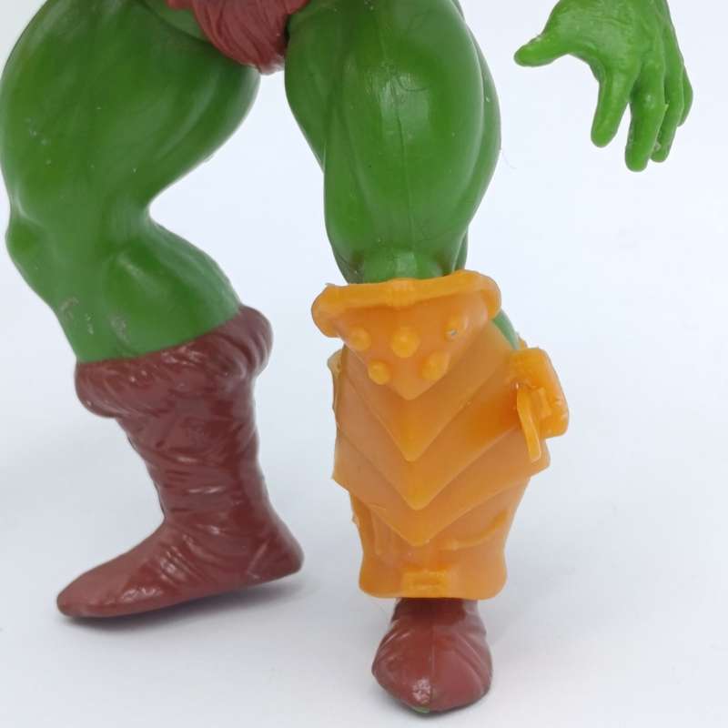 Vintage Masters of the Universe Man-at-Arms figurine with weapons and accessories