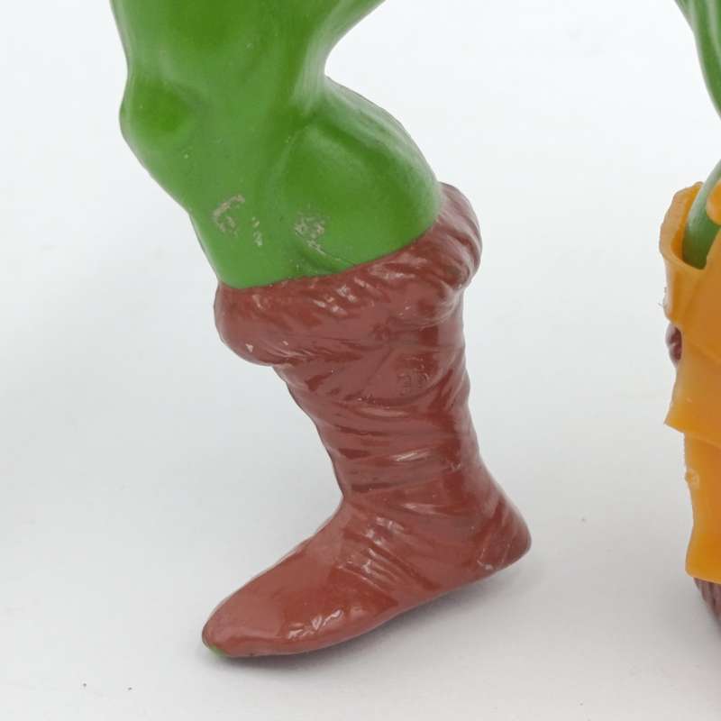 Vintage Masters of the Universe Man-at-Arms figurine with weapons and accessories