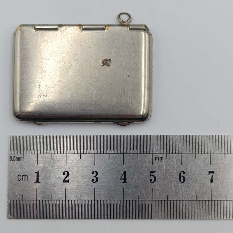 Vintage nickleplated stamp holder case