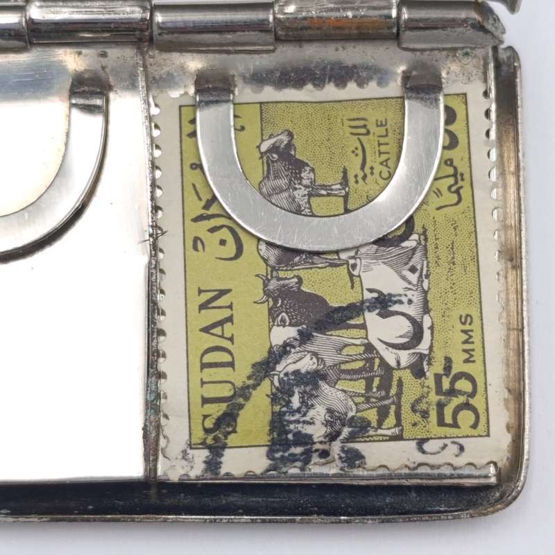 Vintage nickleplated stamp holder case