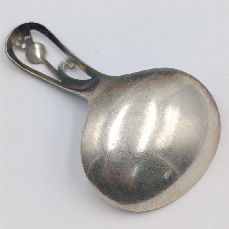 Antique Scottish silverplated tea caddy spoon with thistle design