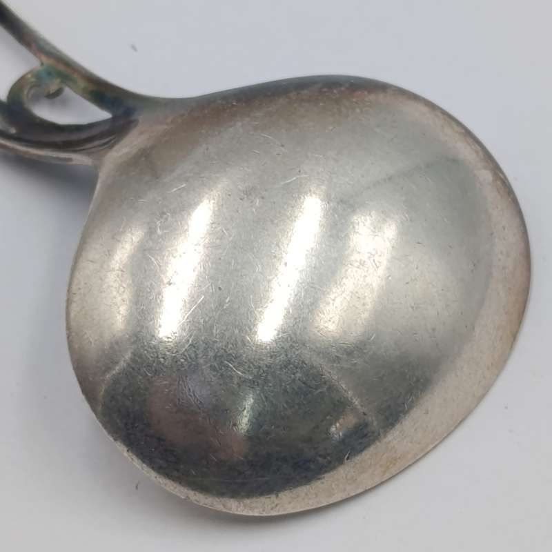 Antique Scottish silverplated tea caddy spoon with thistle design