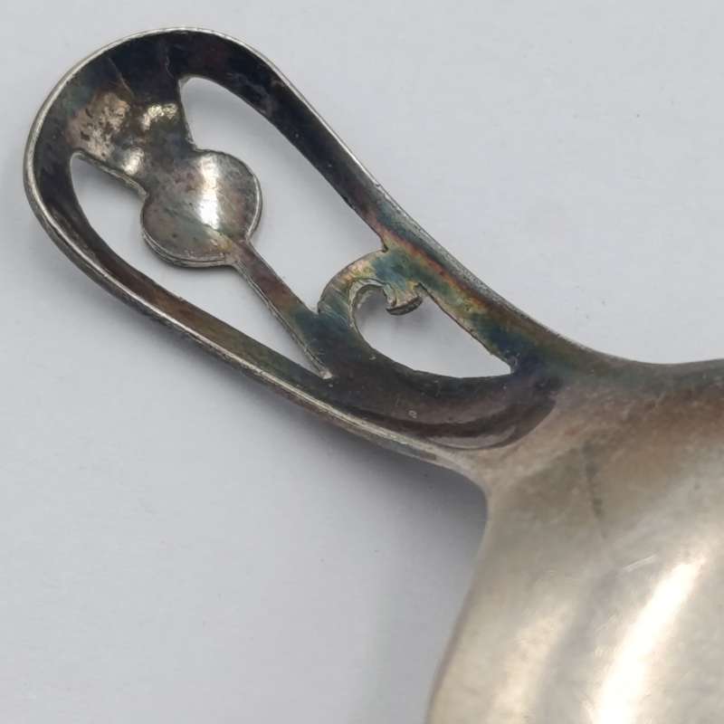 Antique Scottish silverplated tea caddy spoon with thistle design