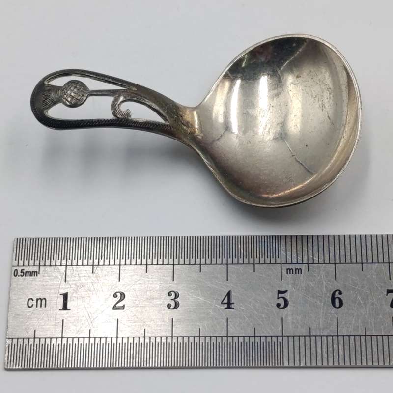 Antique Scottish silverplated tea caddy spoon with thistle design
