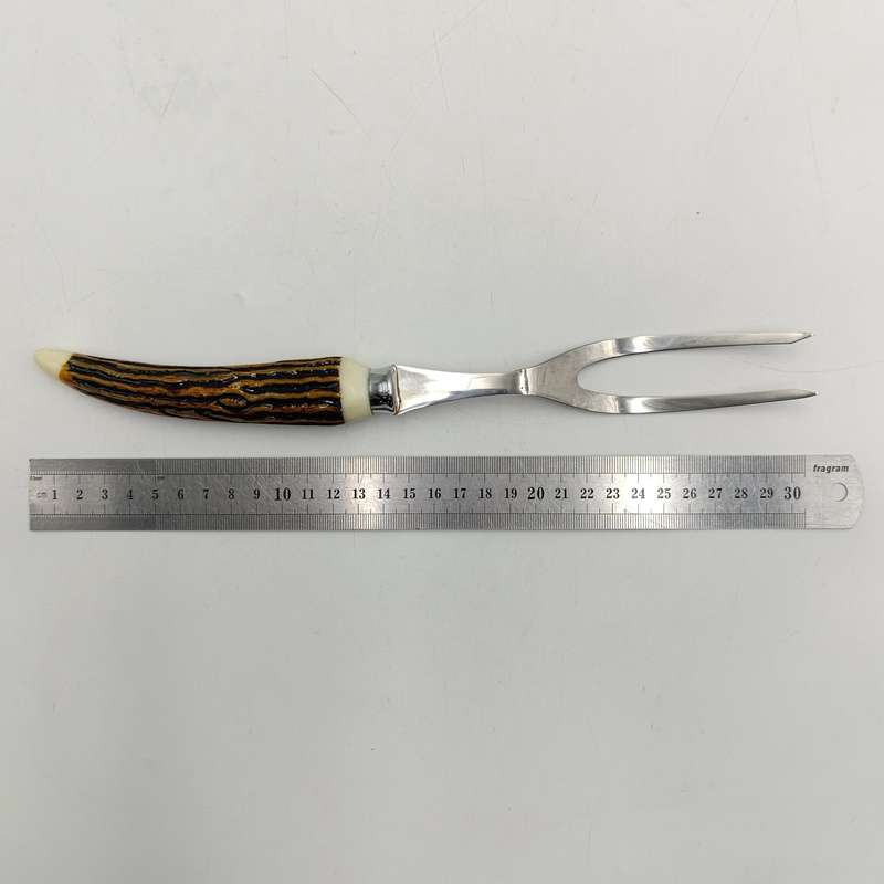 Vintage Steel meat carving for and knife with imitation horn handles