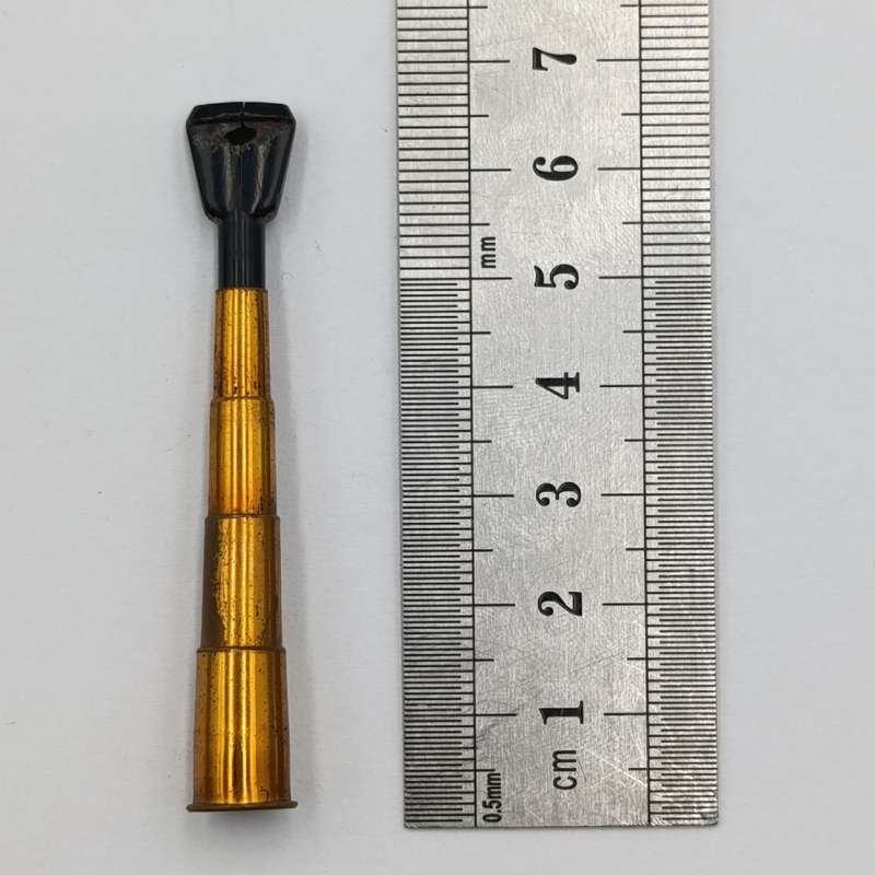 Antique telescope cigarette mouthpiece in holder