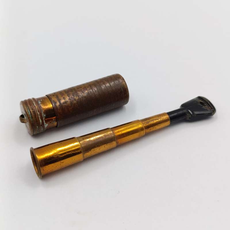Antique telescope cigarette mouthpiece in holder