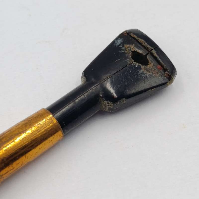 Antique telescope cigarette mouthpiece in holder
