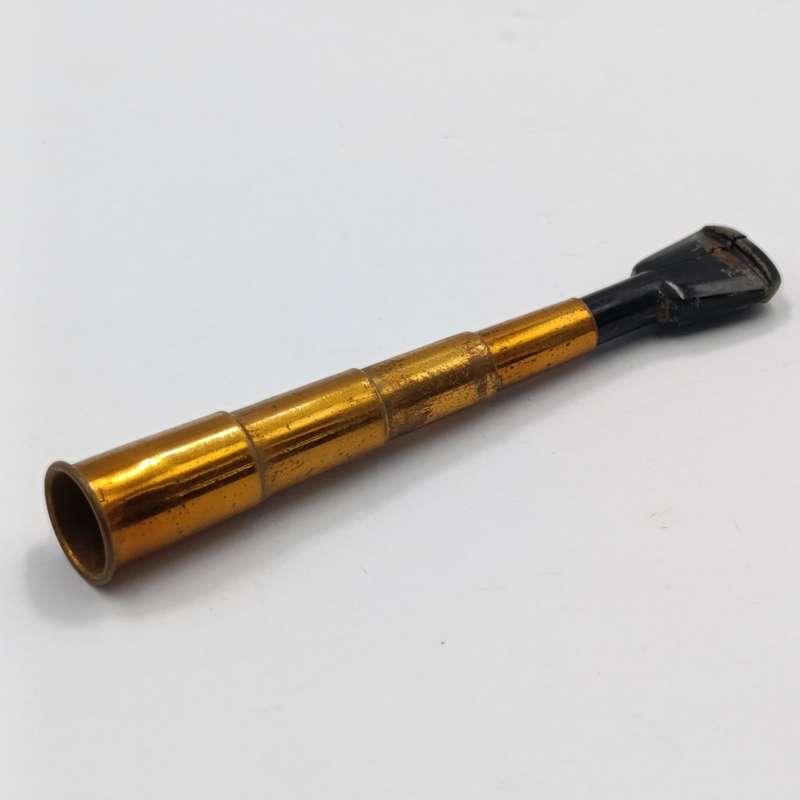 Antique telescope cigarette mouthpiece in holder