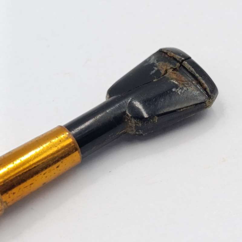 Antique telescope cigarette mouthpiece in holder