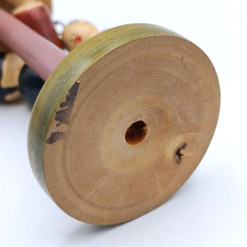 Vintage Japanese wooden spinning swing toy