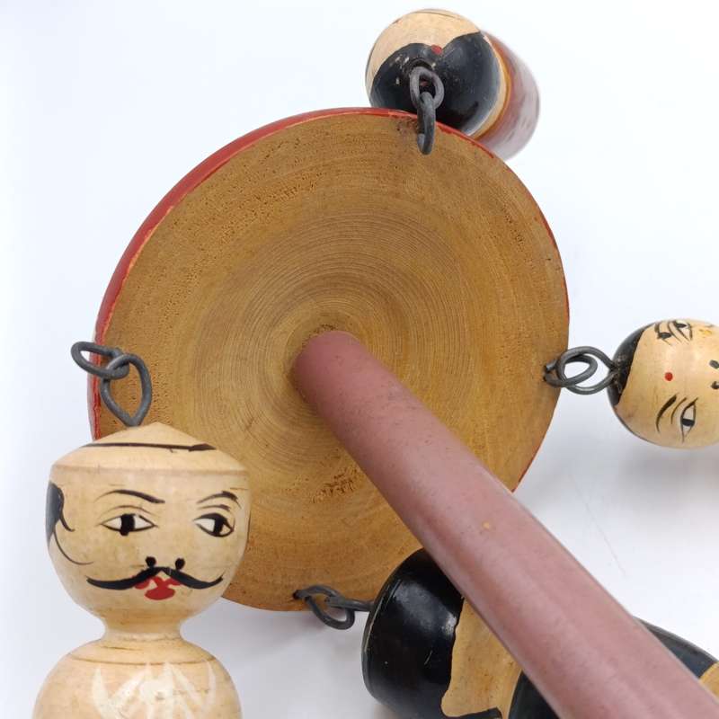 Vintage Japanese wooden spinning swing toy