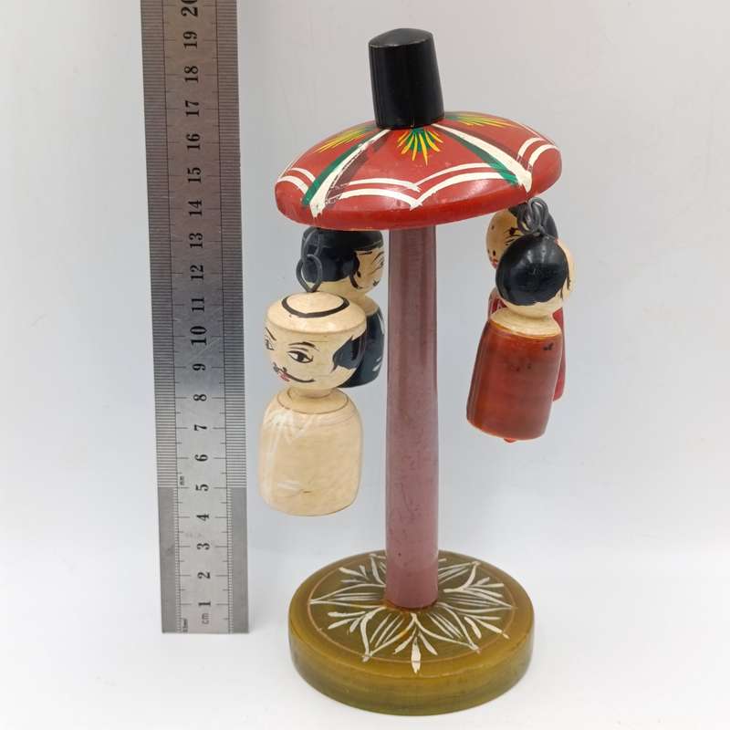Vintage Japanese wooden spinning swing toy