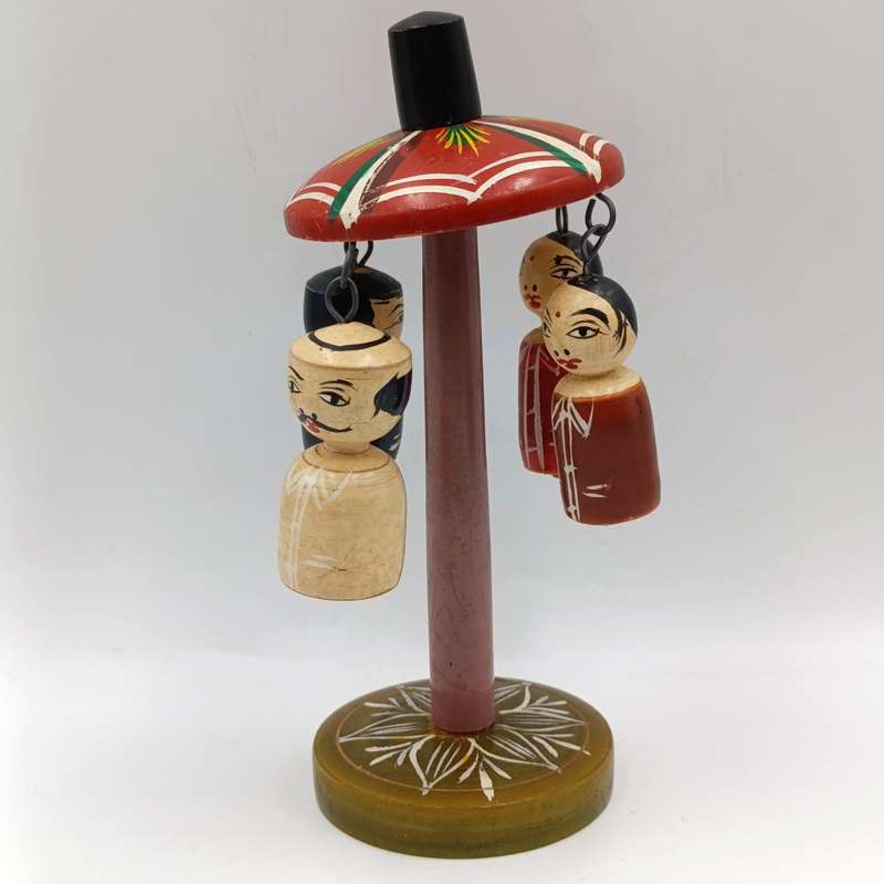 Vintage Japanese wooden spinning swing toy
