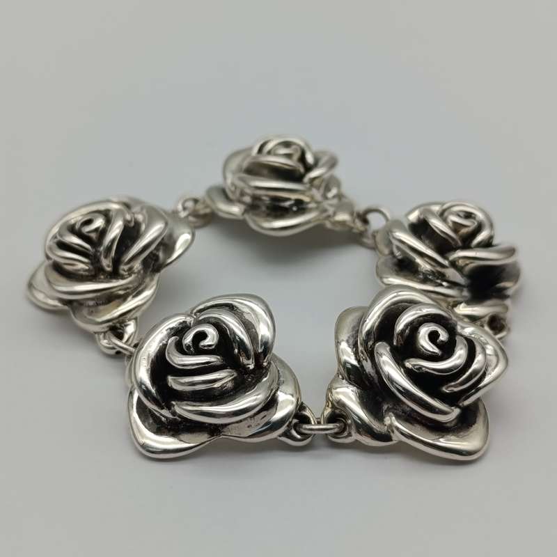 Sterling silver flower design bracelet - weight 28.2g