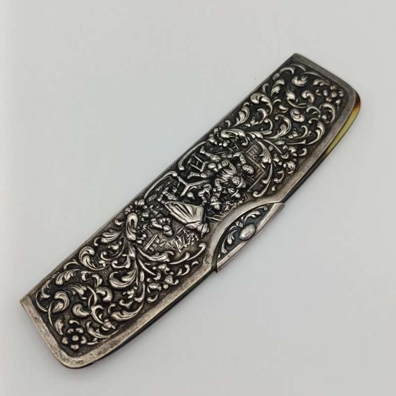 Vintage Faux tortoise shell comb with silver plated comb cover