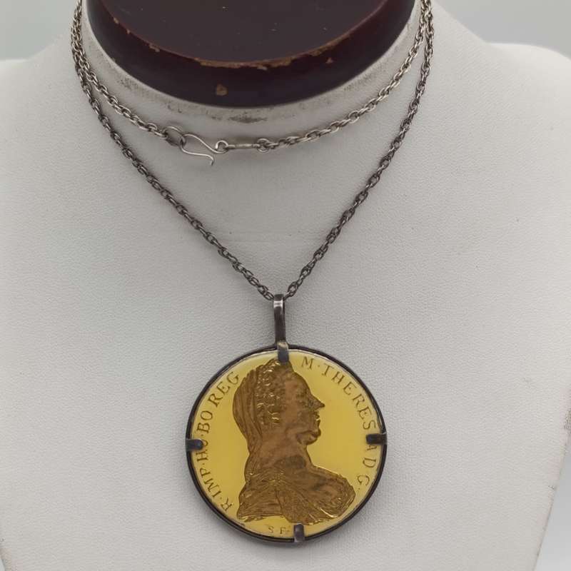 1780 Silver Maria Theresia Thaler Goldplated and epoxy in silver surround - with silver chair