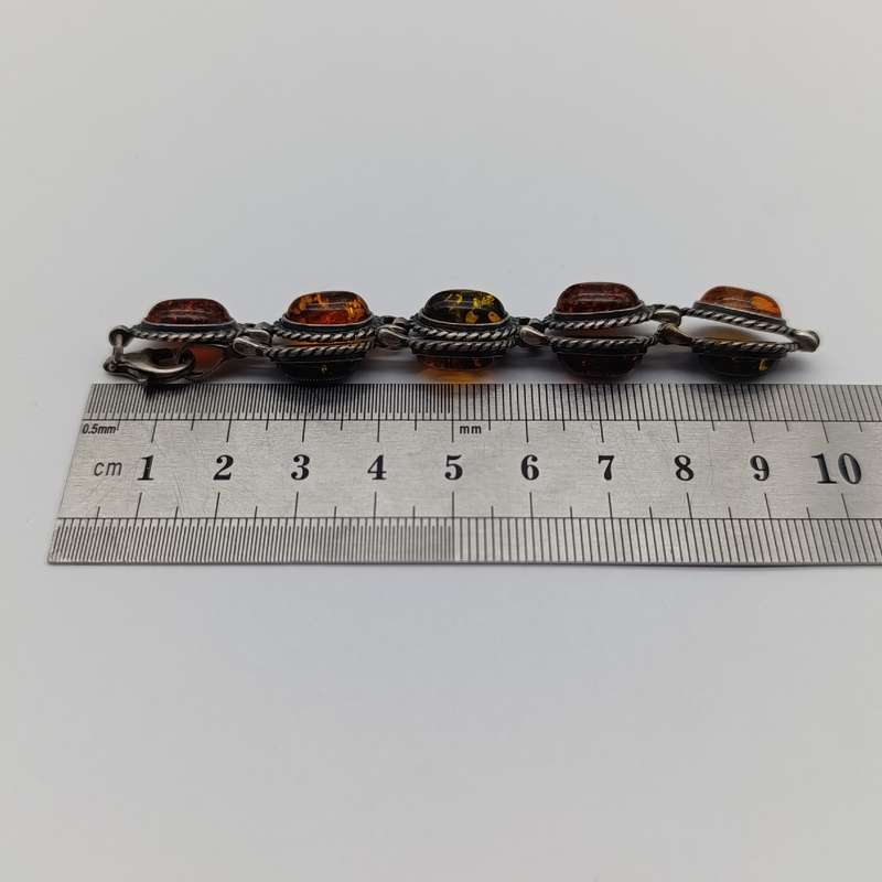 Sterling silver Bracelet with 9 pieces of amber - beautiful piece - 17g