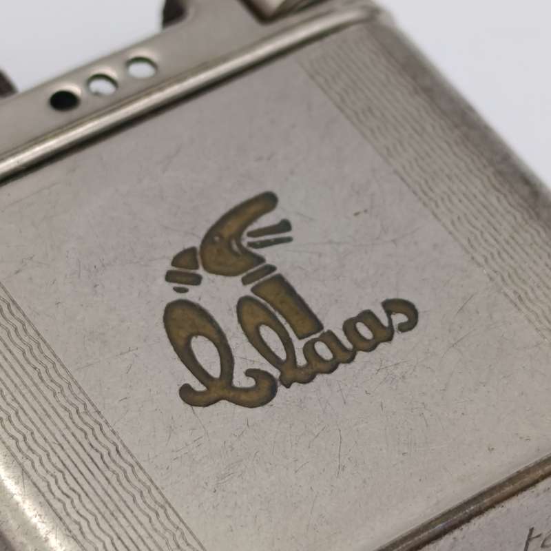 Vintage Rowonta pocket lighter with Claas advertising - working