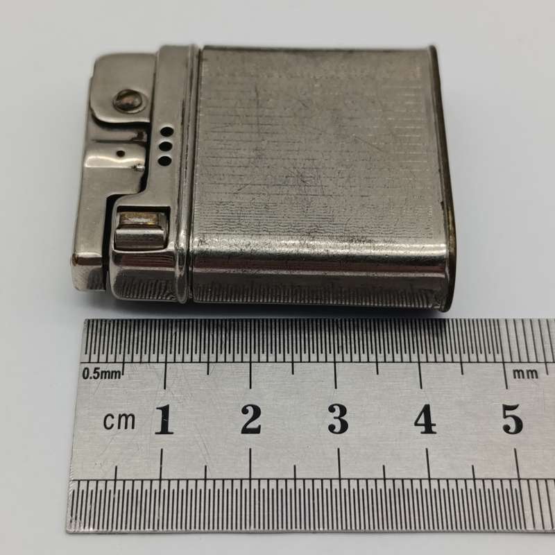 Vintage Rowonta pocket lighter with Claas advertising - working
