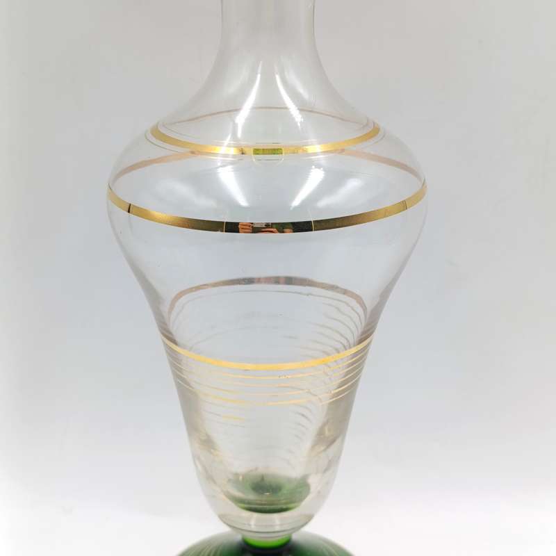 Beautiful vintage glass decanter with green glass top