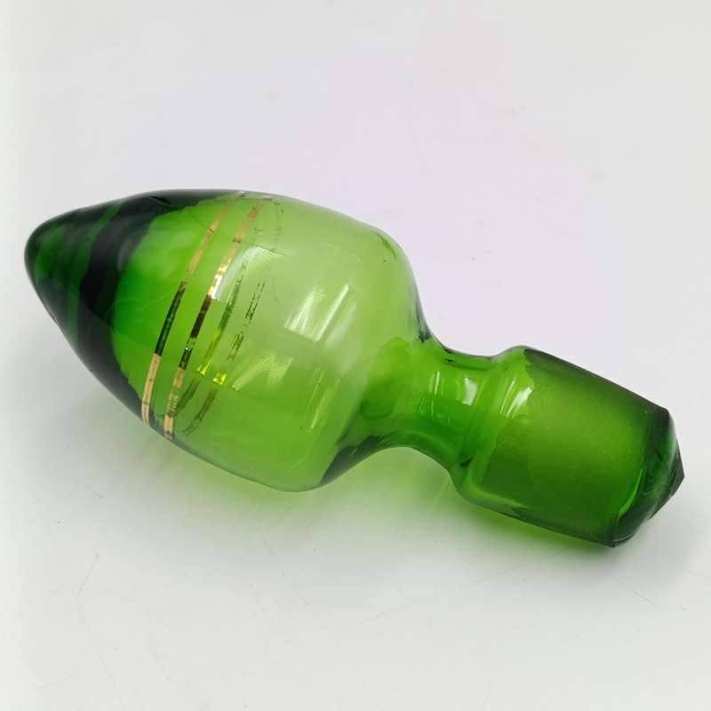 Beautiful vintage glass decanter with green glass top