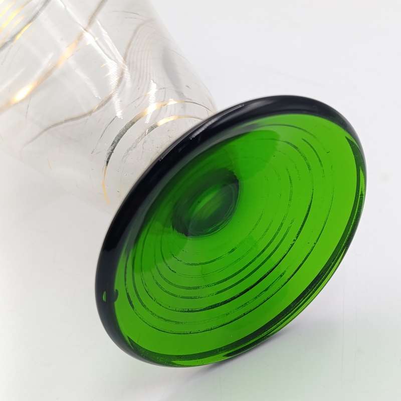 Beautiful vintage glass decanter with green glass top