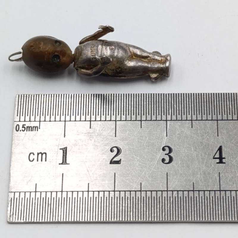WW1 period Fumsup metal and wood charm