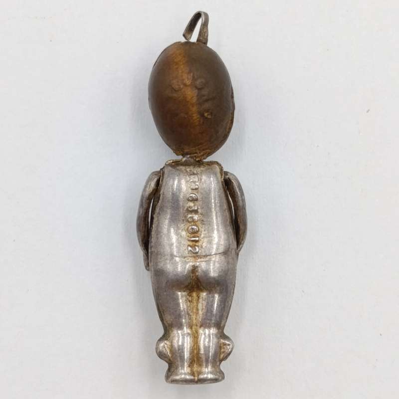 WW1 period Fumsup metal and wood charm