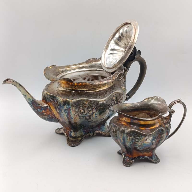 Vintage silverplated teapot with milk jug