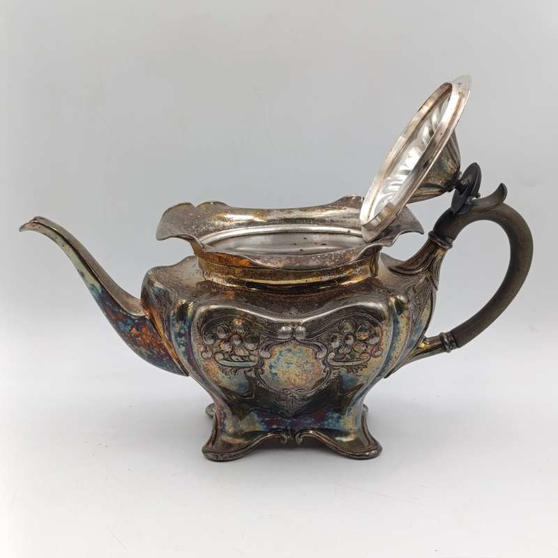 Vintage silverplated teapot with milk jug