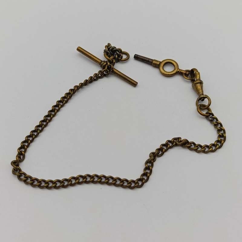Antique brass pocketwatch fob chain with pocketwatch key