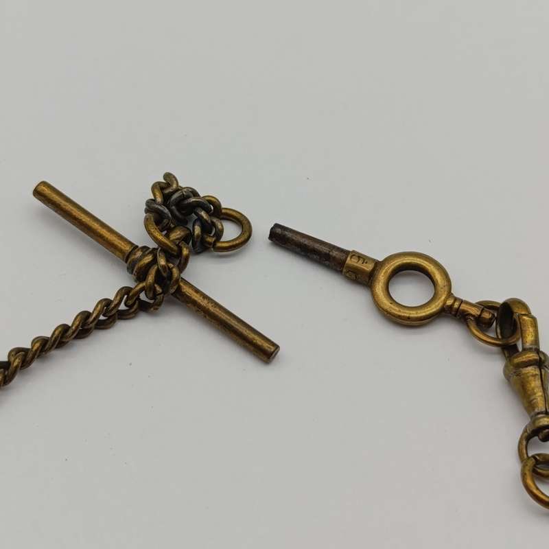 Antique brass pocketwatch fob chain with pocketwatch key
