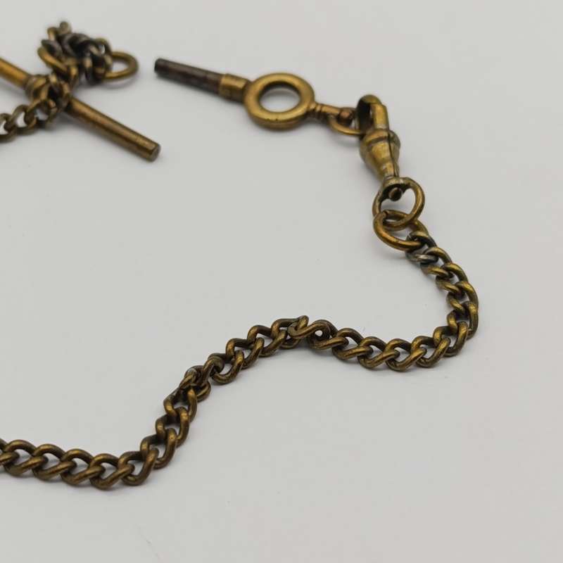 Antique brass pocketwatch fob chain with pocketwatch key