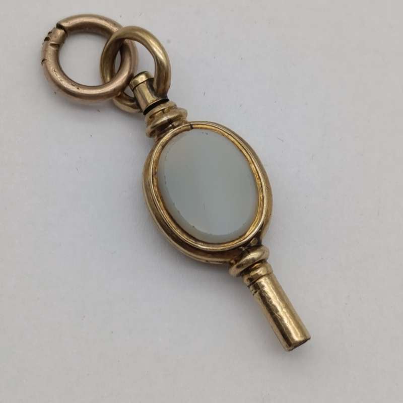 Antique 9kt Gold pocketwatch fob key with stone inserts - weighs 3.9g