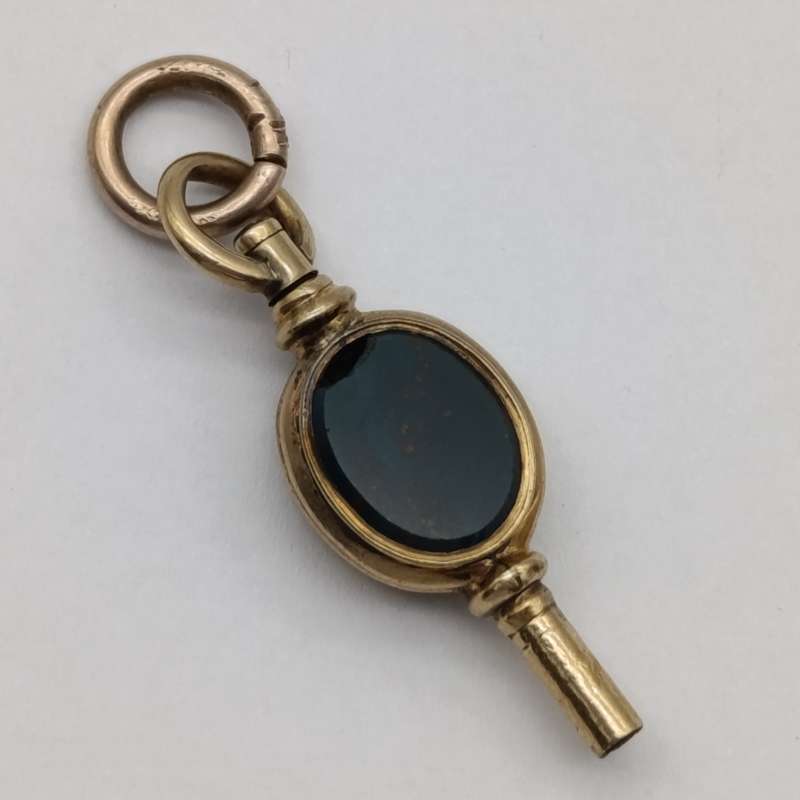 Antique 9kt Gold pocketwatch fob key with stone inserts - weighs 3.9g