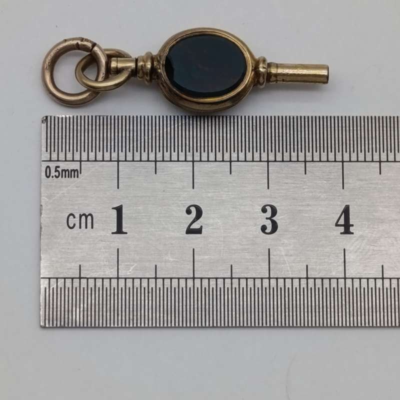 Antique 9kt Gold pocketwatch fob key with stone inserts - weighs 3.9g