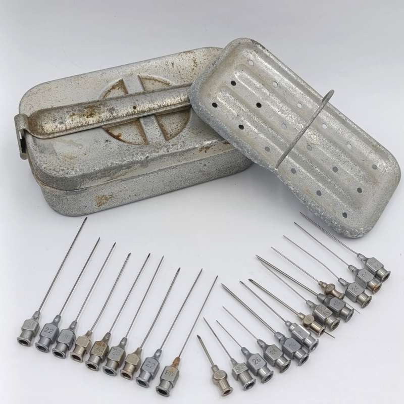 Vintage glass syringe holder/ sterilizer with 20 vintage syringe needles