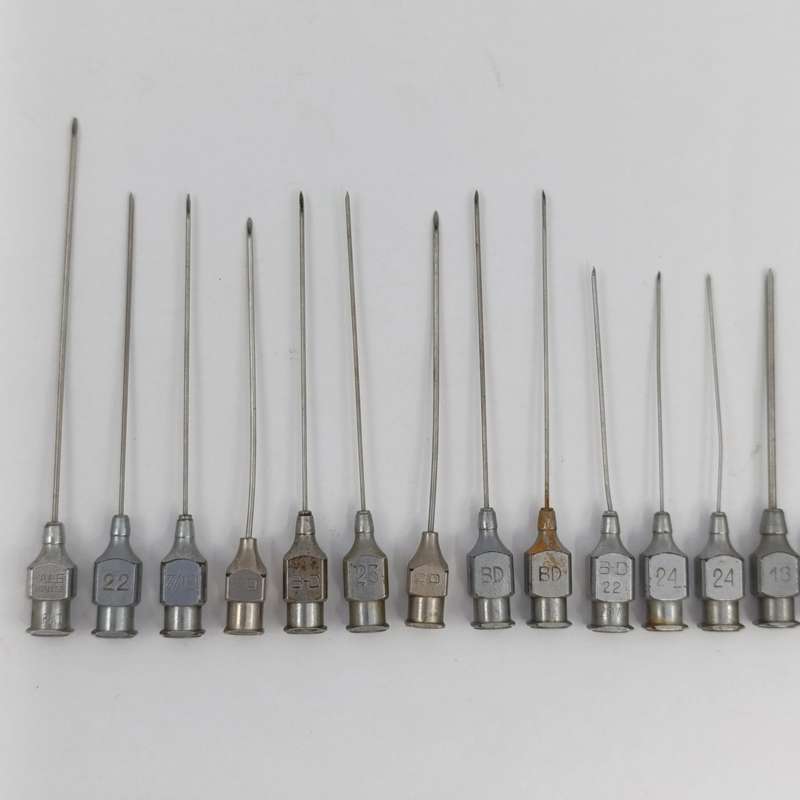 Vintage glass syringe holder/ sterilizer with 20 vintage syringe needles