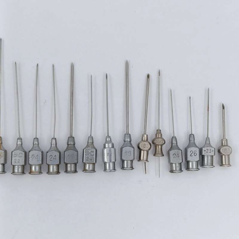 Vintage glass syringe holder/ sterilizer with 20 vintage syringe needles