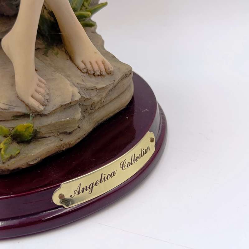Beautiful Angelica Collection poly resin figurine of girl with book