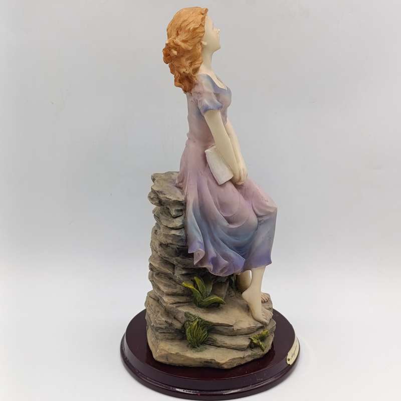 Beautiful Angelica Collection poly resin figurine of girl with book