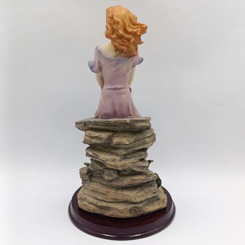 Beautiful Angelica Collection poly resin figurine of girl with book