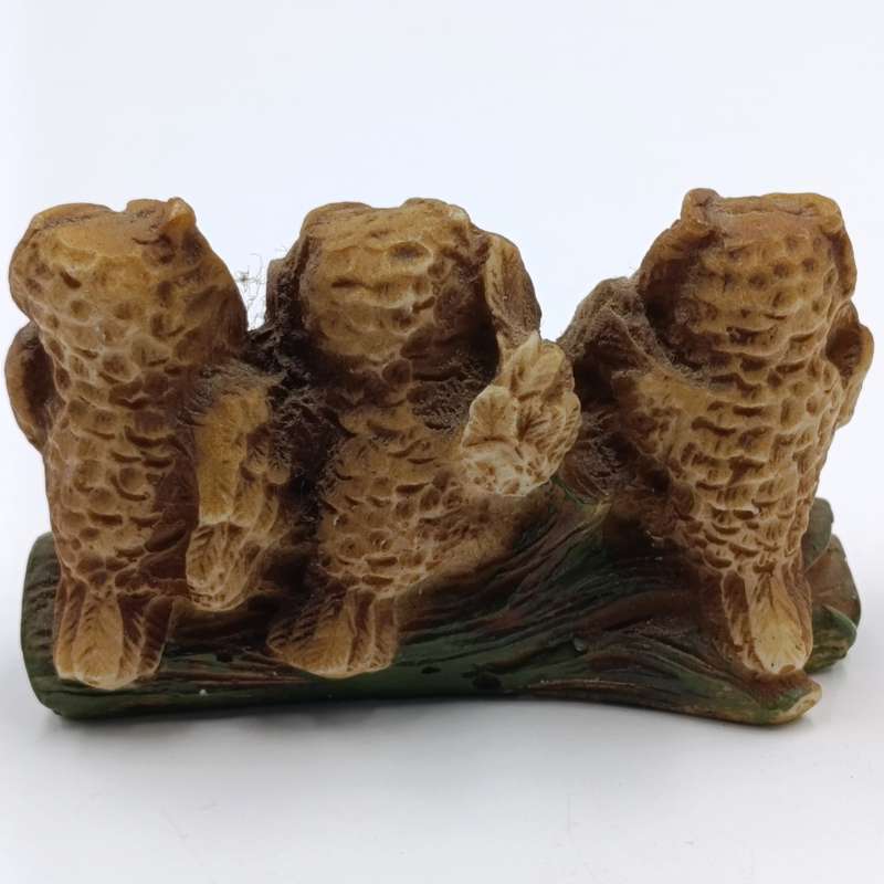 See no evil, hear no evil, speak no evil owl figurine