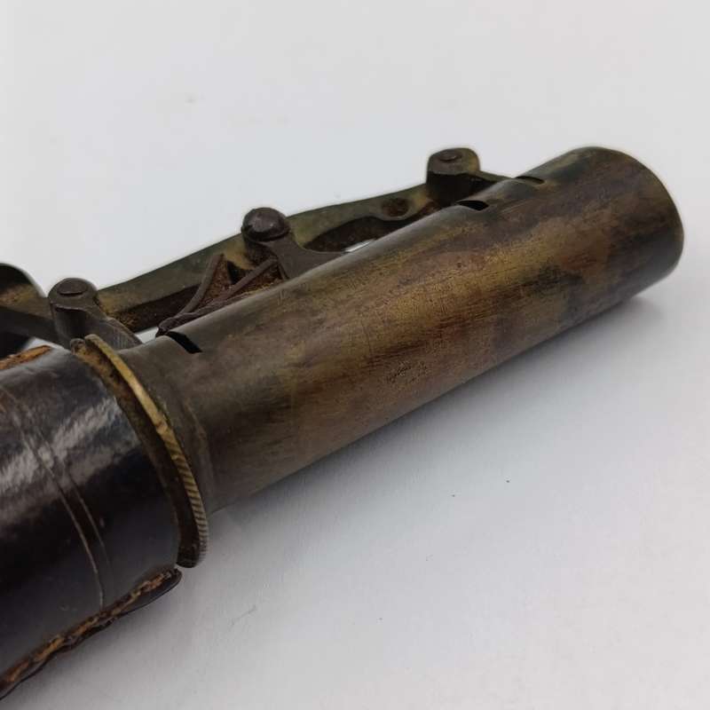 Antique musket ball pouch with brass applicator
