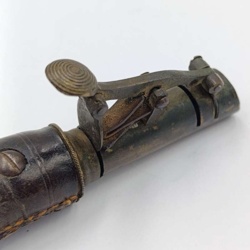 Antique musket ball pouch with brass applicator