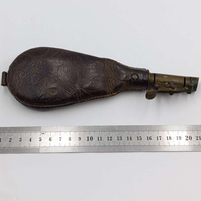 Antique musket ball pouch with brass applicator