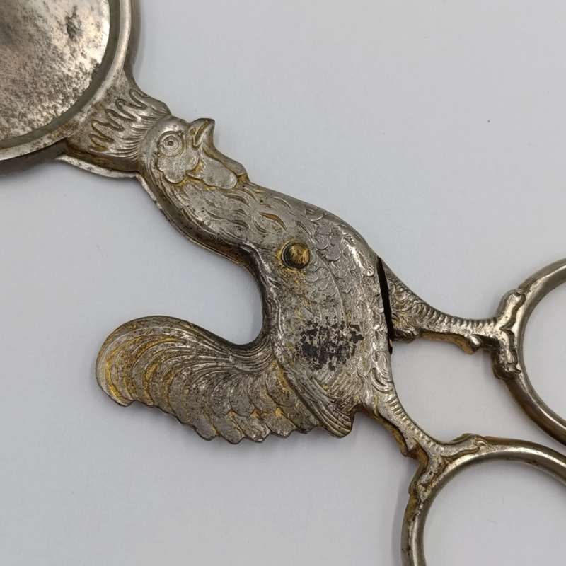 Vintage candle snuffer with rooster